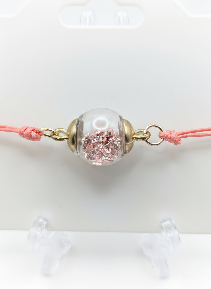 Pink Stone Fleck Glass Globe Bracelet on Pink Cord