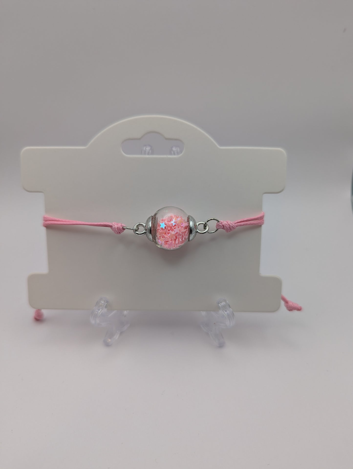 Baby Pink Glitter Globe Bracelet on Adjustable Nylon Cord