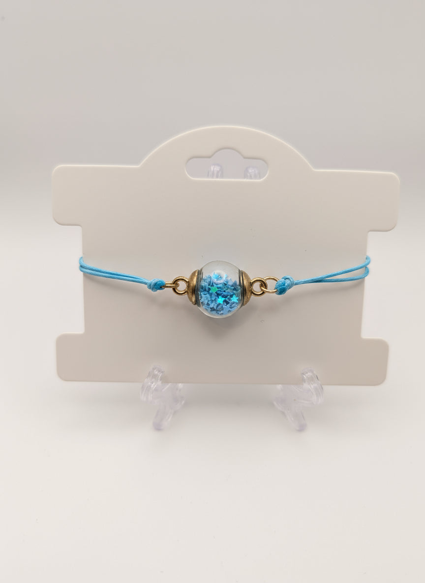 Sky Blue Glitter Globe Bracelet on Adjustable Cord