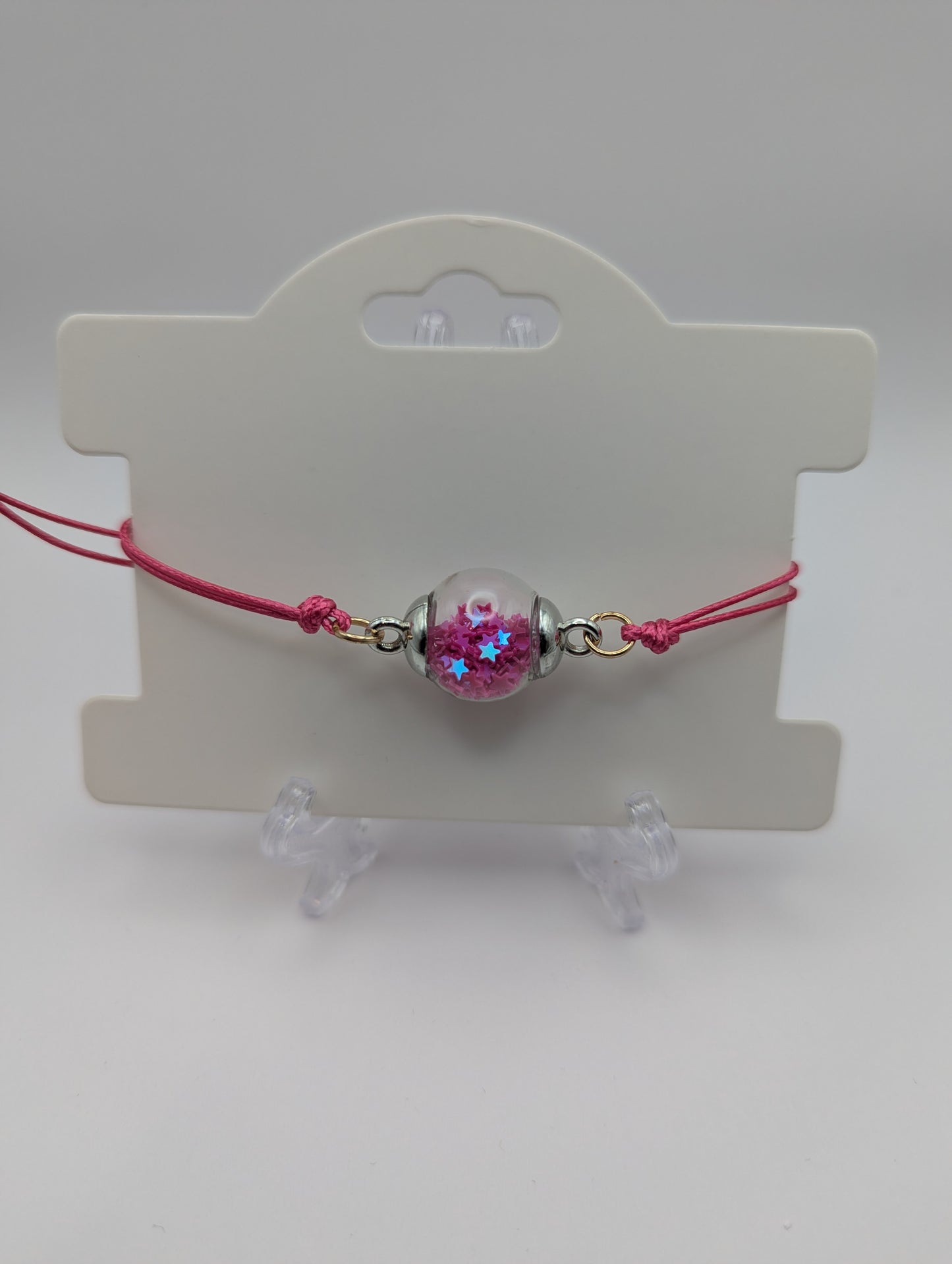 Fuchsia Glitter Globe Bracelet on Adjustable Cord