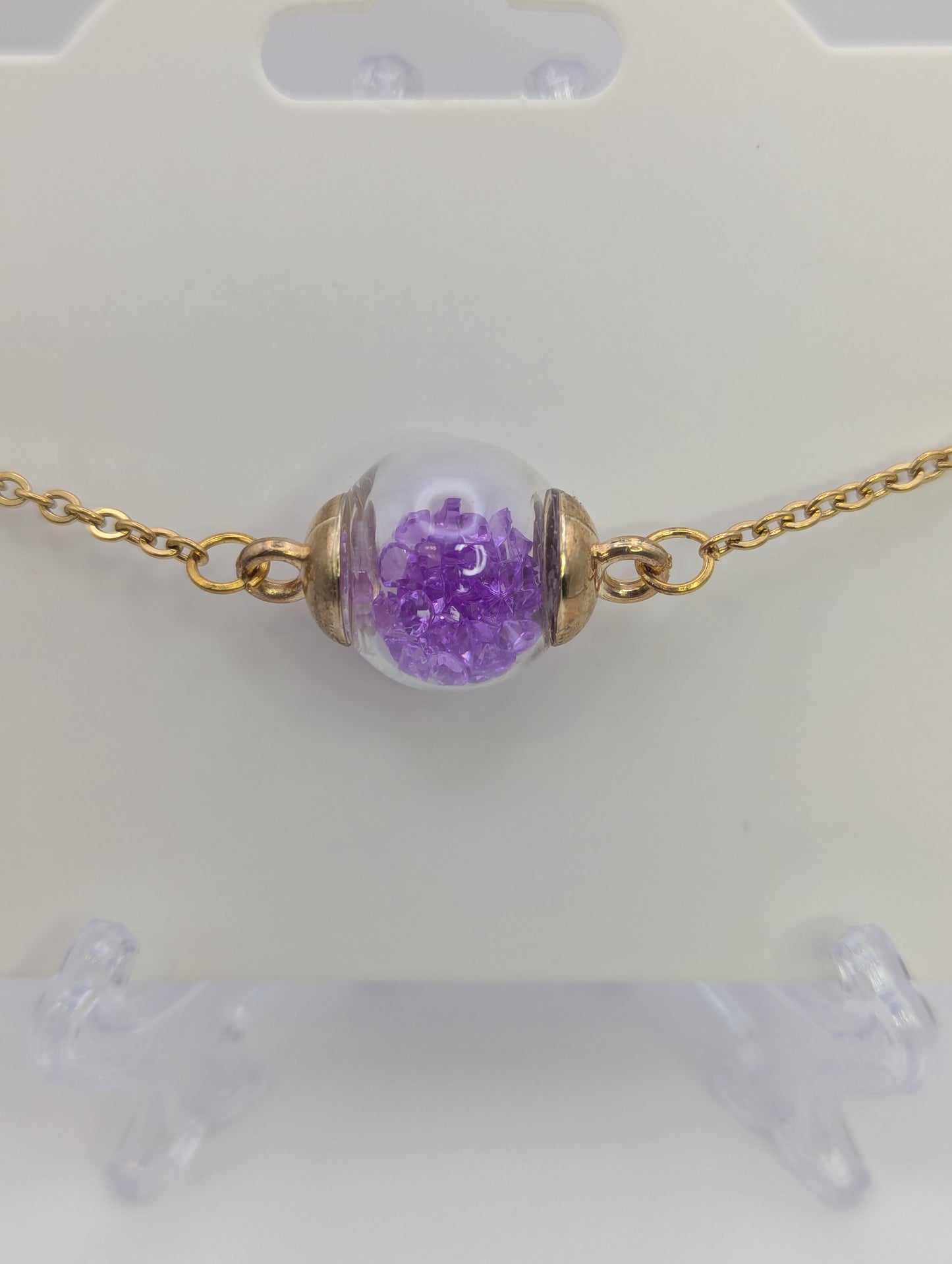 Violet Rhinestones in Glass Globe on Gold Bracelet