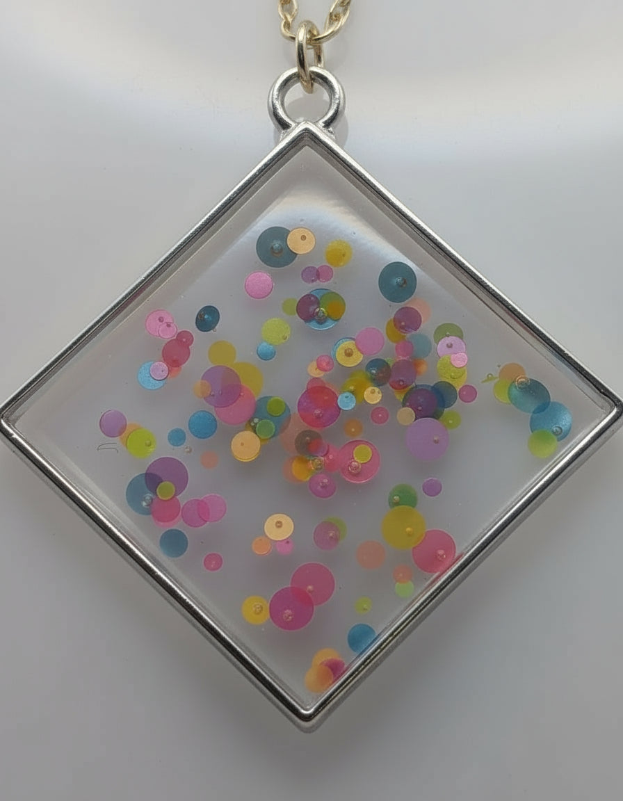 Neon Bubbles Abstract Resin Pendant on Green Nylon Cord