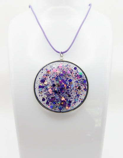Multidimensional Purple Glitter Resin Pendant on Purple Nylon Cord