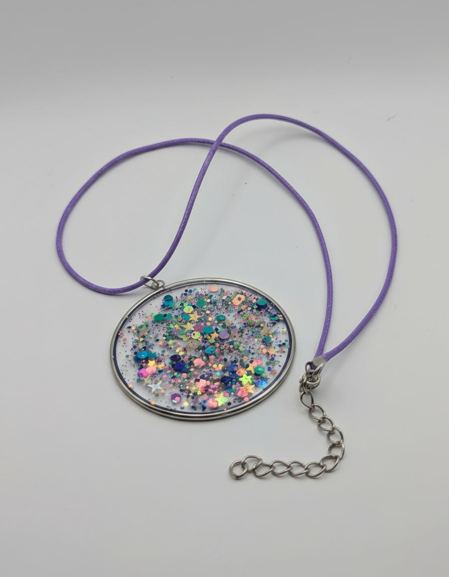 Multidimensional Purple Glitter Resin Pendant on Purple Nylon Cord