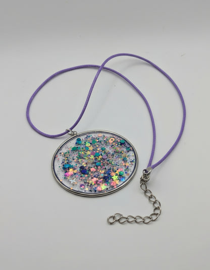 Multidimensional Purple Glitter Resin Pendant on Purple Nylon Cord