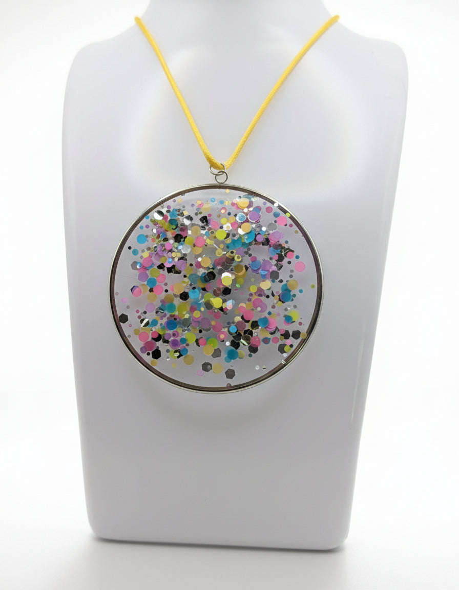 Multidimensional Neon Glitter Resin Pendant on Yellow Nylon Cord