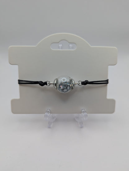 Silver Star Glitter Globe Bracelet on Adjustable Black Nylon Cord