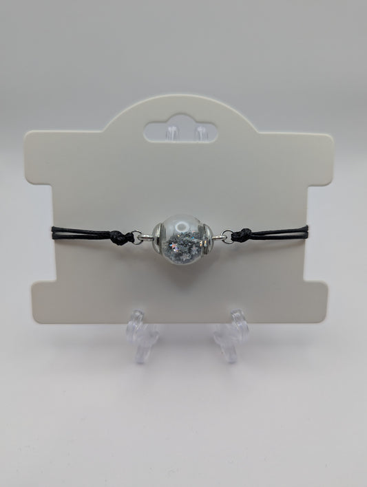 Silver Star Glitter Globe Bracelet on Adjustable Black Nylon Cord