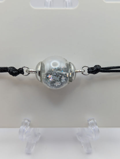 Silver Star Glitter Globe Bracelet on Adjustable Black Nylon Cord