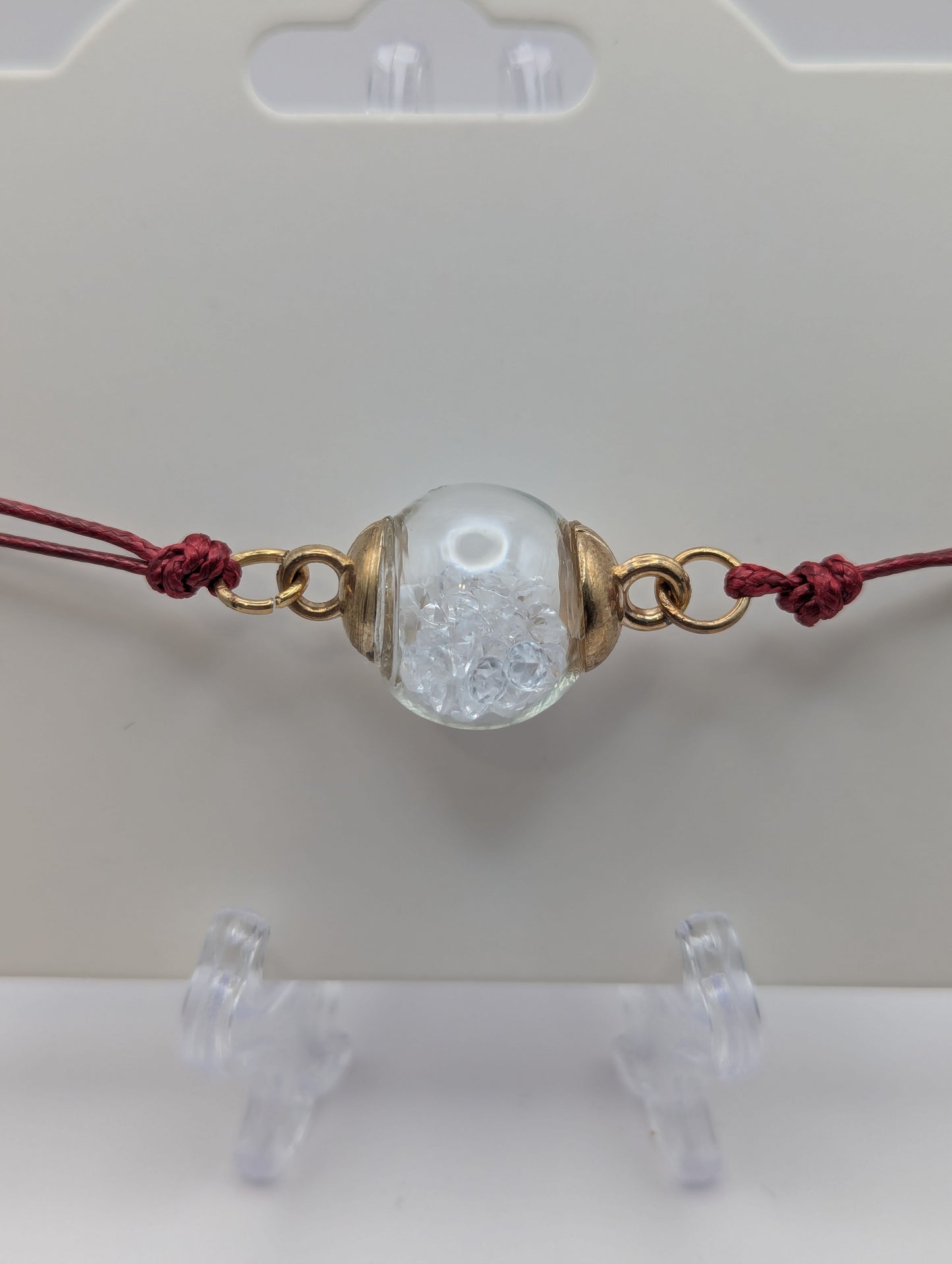 White Rhinestones Globe Bracelet on Maroon Nylon Cord