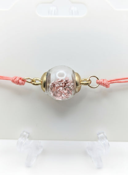 Pink Stone Fleck Glass Globe Bracelet on Pink Cord