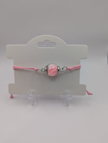 Baby Pink Glitter Globe Bracelet on Adjustable Nylon Cord