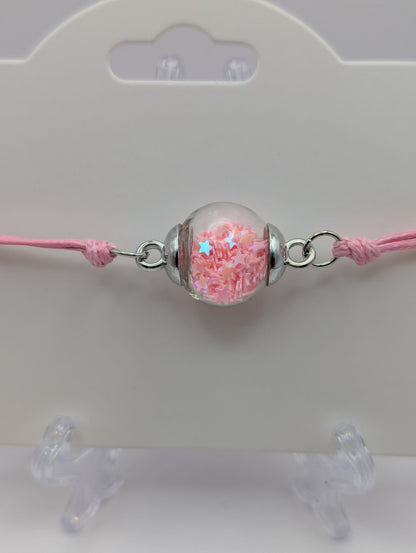 Baby Pink Glitter Globe Bracelet on Adjustable Nylon Cord
