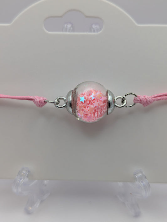 Baby Pink Glitter Globe Bracelet on Adjustable Nylon Cord