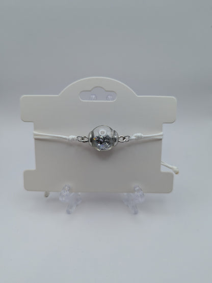 Silver Star Glitter Globe Bracelet on Adjustable White Nylon Cord
