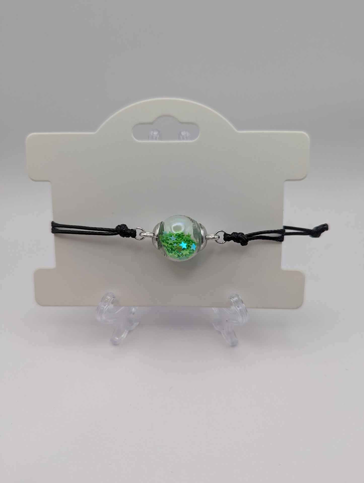 Lime Star Glitter Globe Bracelet on Adjustable Black Cord