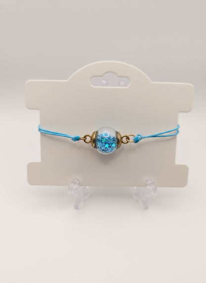 Sky Blue Glitter Globe Bracelet on Adjustable Cord