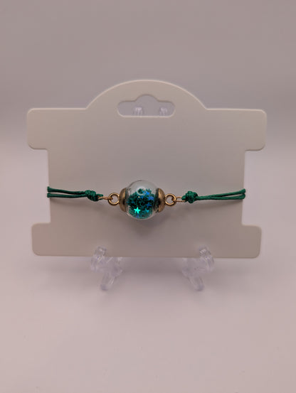 Dark Teal Star Glitter Globe Bracelet on Green Cord