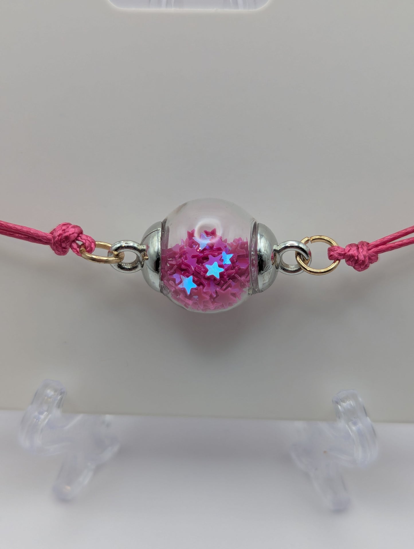 Fuchsia Glitter Globe Bracelet on Adjustable Cord