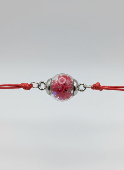 Red Star Glitter Globe Bracelet on Adjustable Red Cord