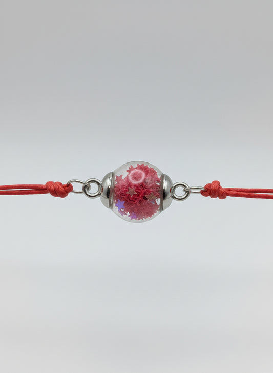 Red Star Glitter Globe Bracelet on Adjustable Red Cord