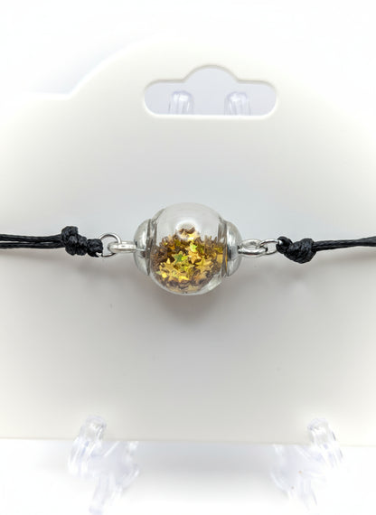 Gold Star Glitter Globe Bracelet on Adjustable Black Cord