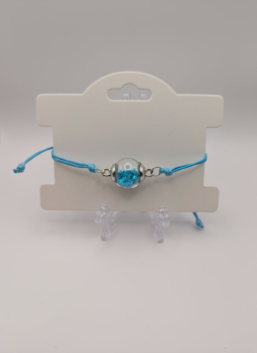 Sky Blue Glitter Globe Bracelet on Adjustable Nylon Cord