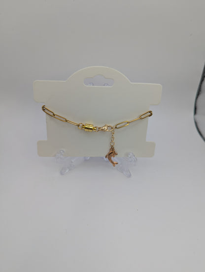 Aquamarine Rhinestone Globe on Gold Paperclip Bracelet With Dolphin Accent