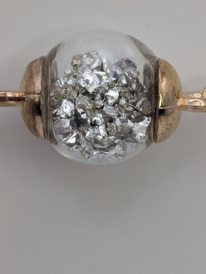 Silver Stone Flecks In Globe on Gold Paperclip Chain Bracelet