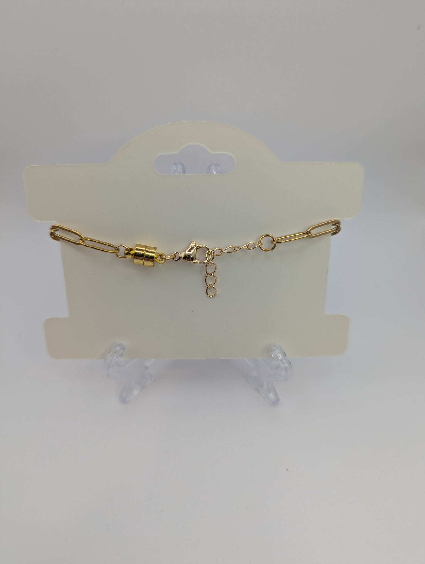 Silver Stone Flecks In Globe on Gold Paperclip Chain Bracelet