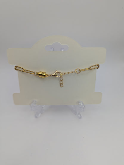 Silver Stone Flecks In Globe on Gold Paperclip Chain Bracelet