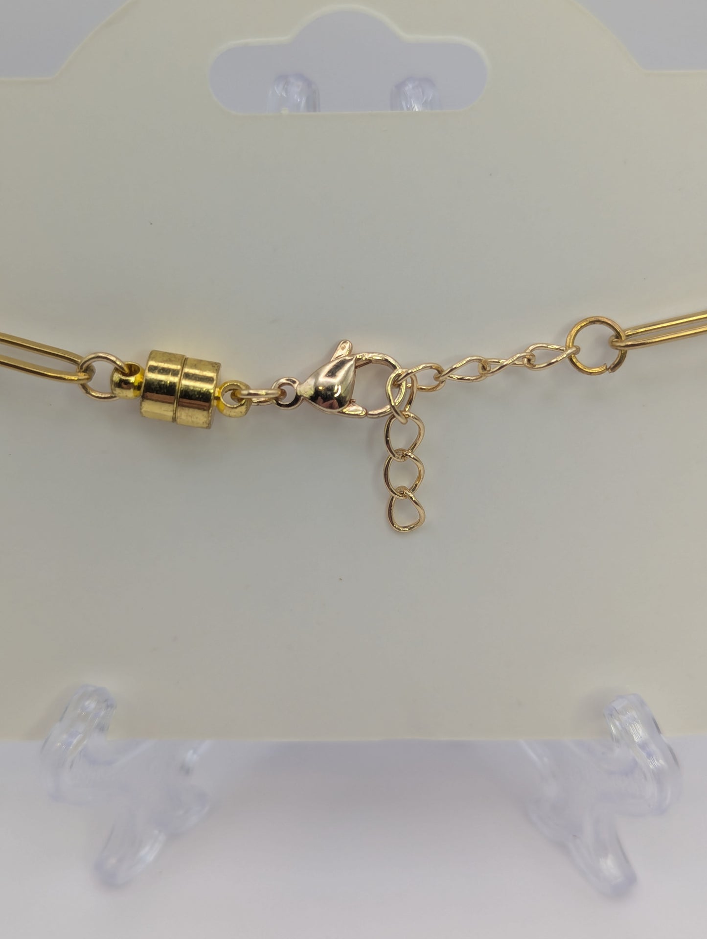 Silver Stone Flecks In Globe on Gold Paperclip Chain Bracelet
