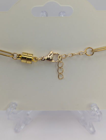 Silver Stone Flecks In Globe on Gold Paperclip Chain Bracelet