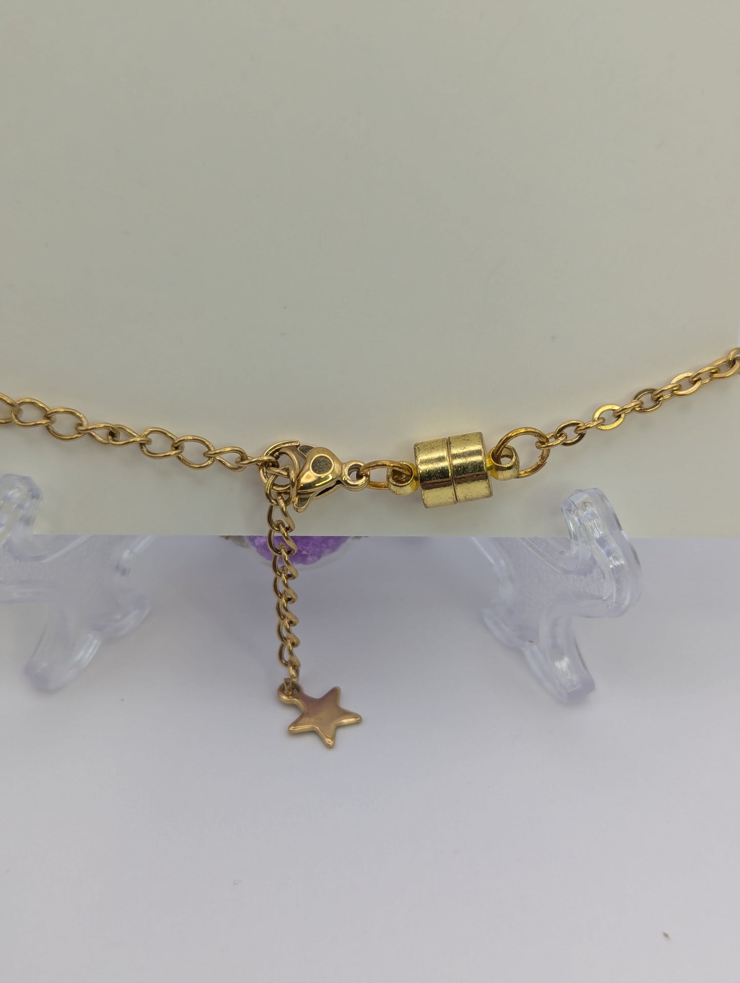 Violet Rhinestones in Glass Globe on Gold Bracelet