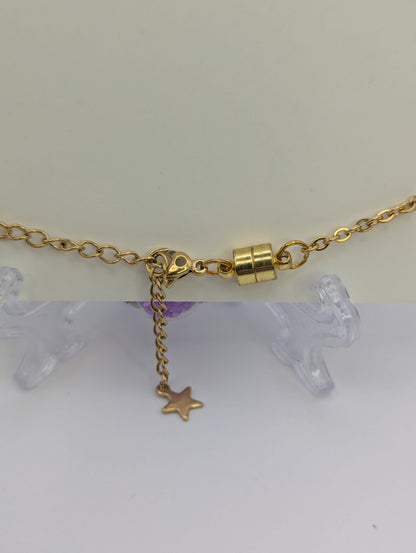 Violet Rhinestones in Glass Globe on Gold Bracelet