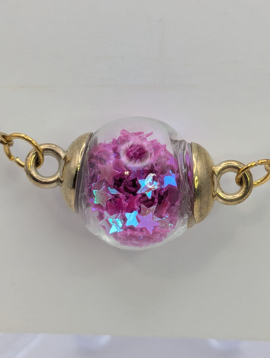Fuchsia Glitter Globe Bracelet on Gold Chain