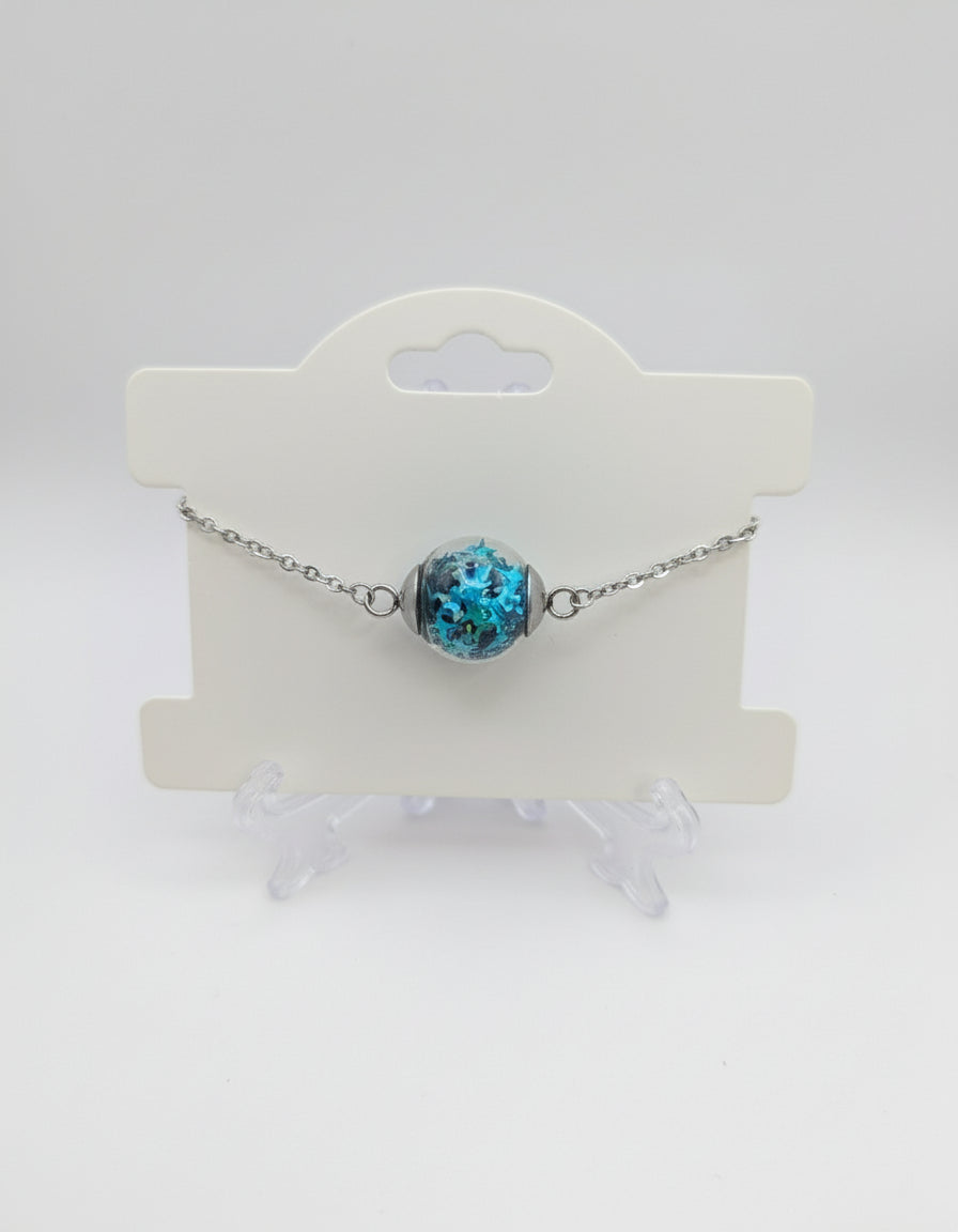 Aquamarine Star Glitter Globe on Adjustable Silver Chain Bracelet
