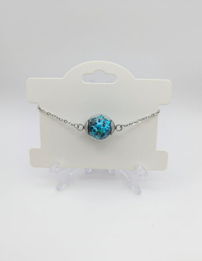 Aquamarine Star Glitter Globe on Adjustable Silver Chain Bracelet