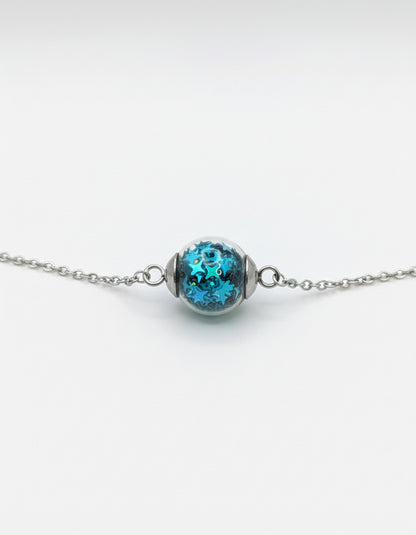 Aquamarine Star Glitter Globe on Adjustable Silver Chain Bracelet